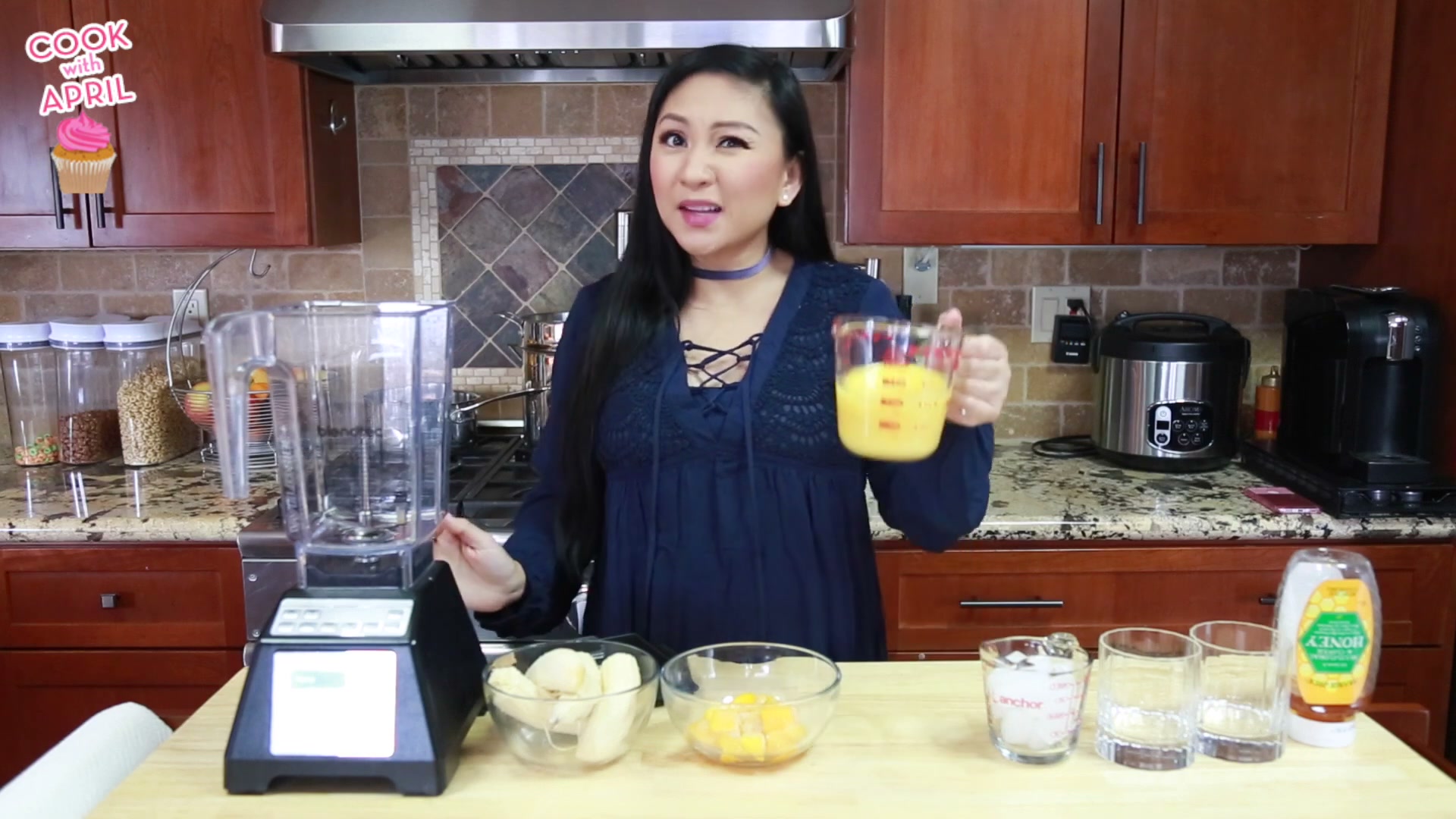 Pouring orange juice into the blender
